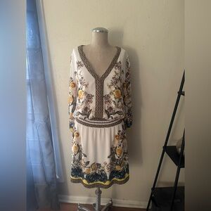 Spring three quarter sleeve dress. Light weight. Only worn once. Hits above knee